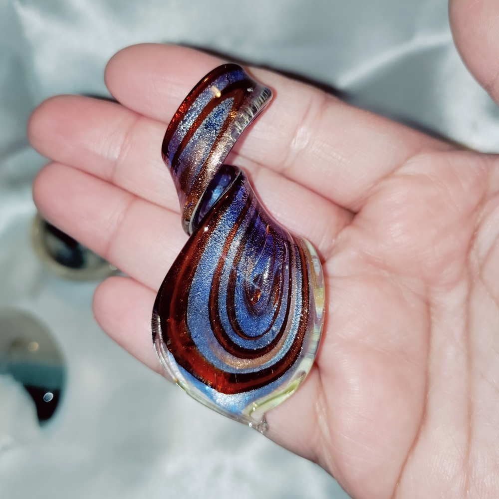 Artistic Glass Pendant with Swirl Design